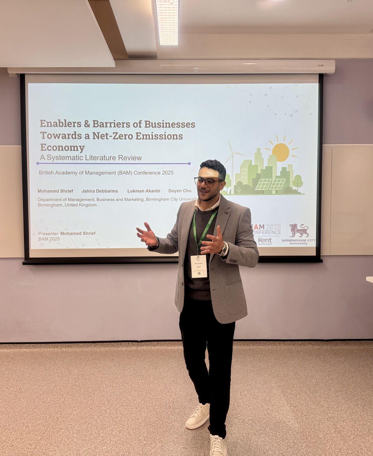 Mohamed Shrief presenting his research on the net-zero transition at the British Academy of Management Conference 2025